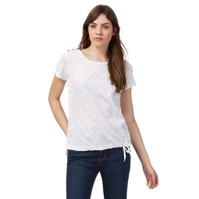 White feather embroidered top